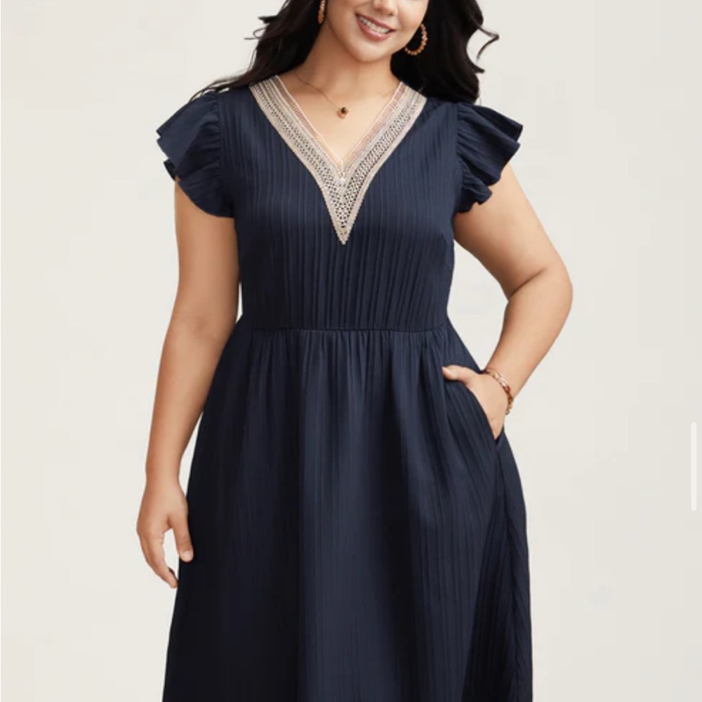 BloomChic Navy Dress with Ruffle Detail